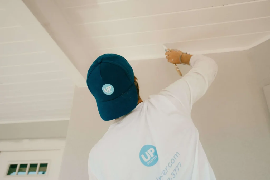 Painter in Sarasota FL professional painting contractor working on project