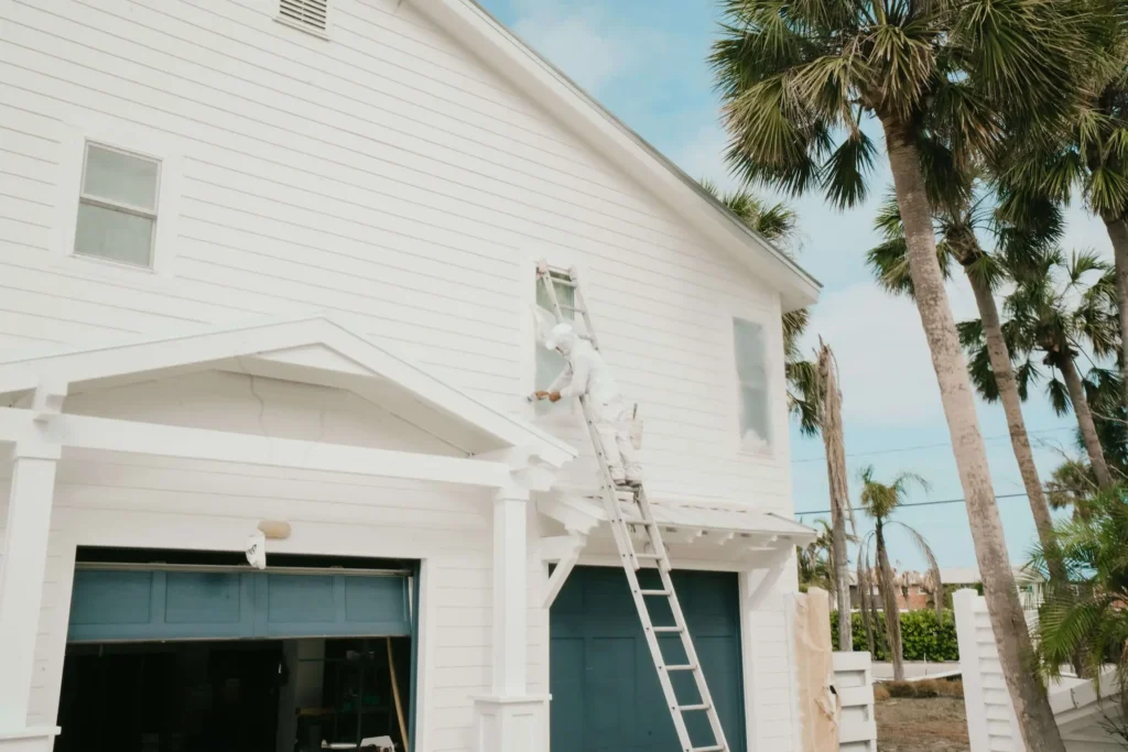 Fresh exterior house painting in Sarasota FL with weather-resistant paint and clean trim work