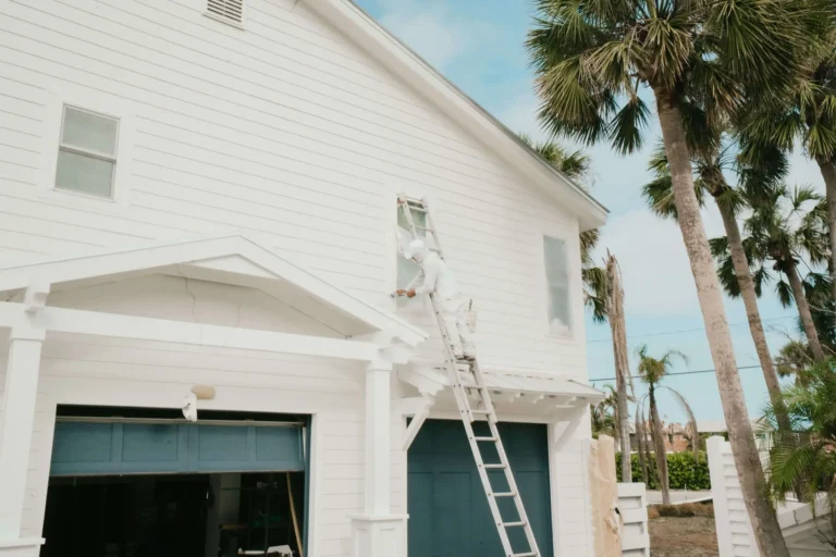 Fresh exterior house painting in Sarasota FL with weather-resistant paint and clean trim work